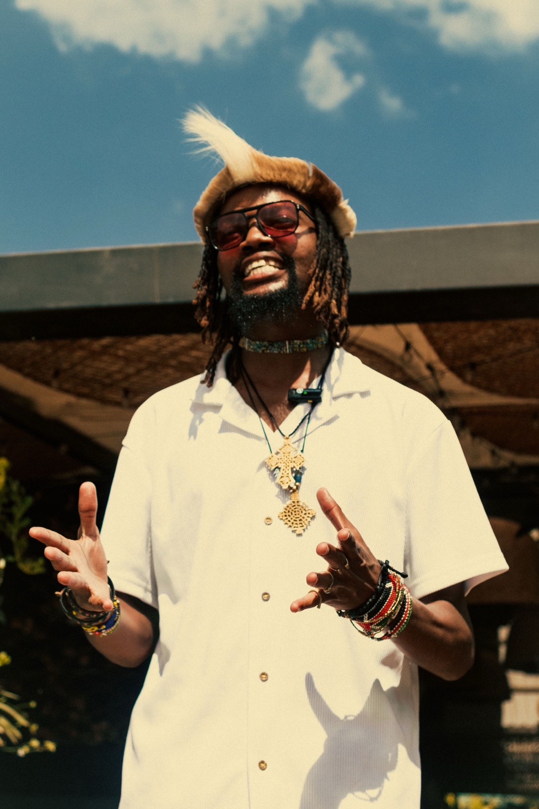 Culture curator Nomadic Rasta against the Nairobi sky
